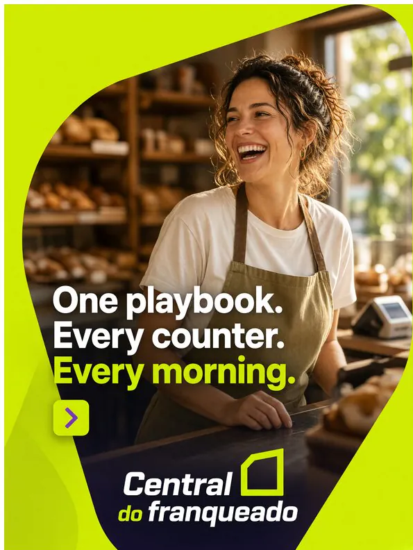 Central do Franqueado: ‘One playbook. Every counter. Every morning.’: a baker laughing behind a bread counter.